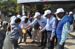 Demonstration on hygiene and hand washing at Balanagar Bus Stop.