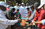 Demonstration on hygiene and hand washing at Balanagar Bus Stop.