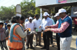 Demonstration on hygiene and hand washing at Balanagar Bus Stop.