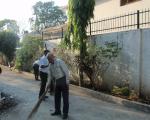 Cleaning of road at Bhawan.